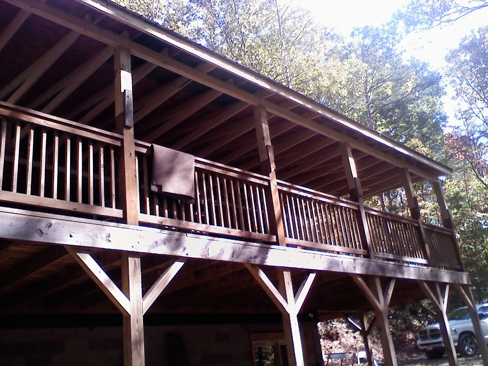 Timber framing under a new elevated porch and deck — Roof Leak Repair in Nancy by Roofing Brothers
